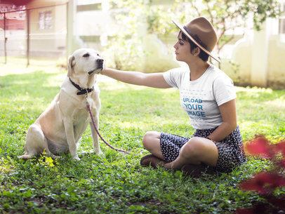 Pretty Woman Wearing a T-Shirt Template while Petting her Dog at a Park
