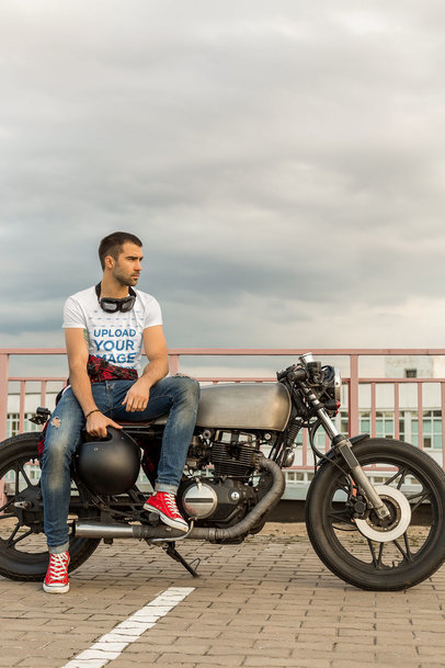 T-Shirt Mockup of a Serious Look Posing on a Bike