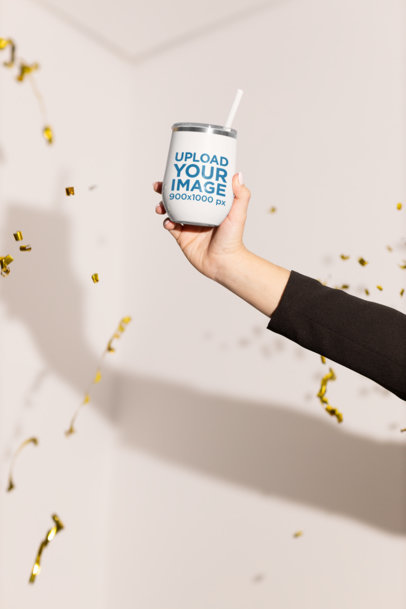 Mokckup of a Woman Lifting a Wine Tumbler in a Festive Setting M20071