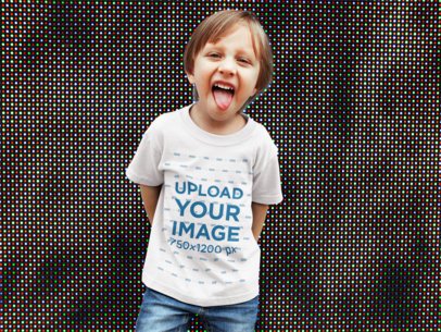 White Boy Making a Funny Face Wearing a Tshirt Mockup Against a Big Screen