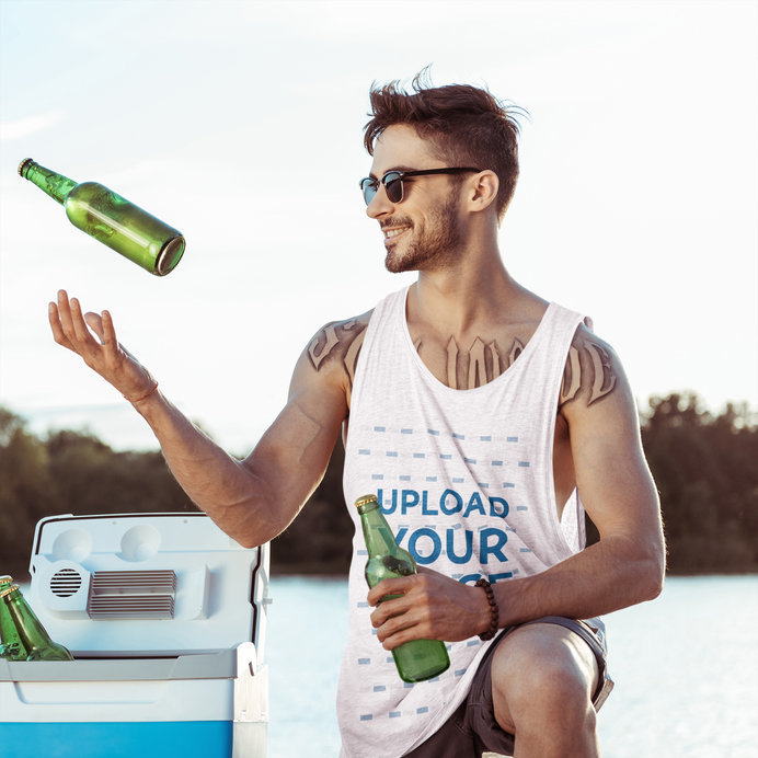 Heathered Tank Top Mockup of a Man with Tattoos Holding a Beer Bottle
