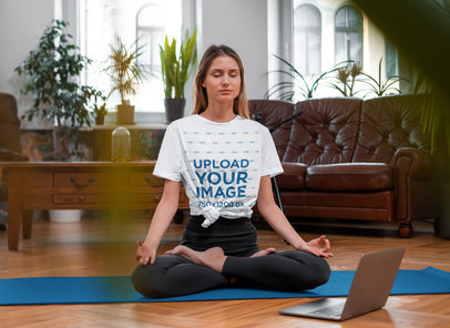T-Shirt Mockup of a Calm Woman Practicing Yoga