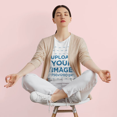 T-Shirt Mockup of a Woman Meditating on a Chair m10338-r-el2