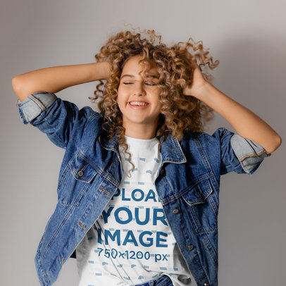 T-Shirt Mockup of a Curly-Haired Woman Having Fun in a Studio m19593-r-el2