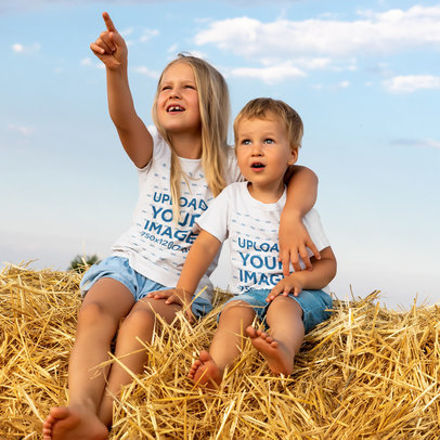 T-Shirt Mockup Featuring Two Siblings Sitting on Hay Bale m19597-r-el2
