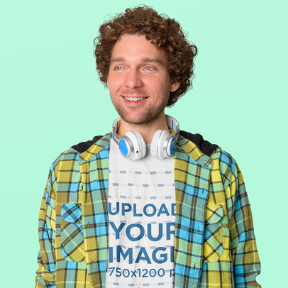 T-Shirt Mockup Featuring a Happy Curly-Haired Man With Headphones on His Neck m19082 r-el2