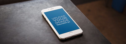 Wide Mockup of an iPhone 6 on a Metal Work Table