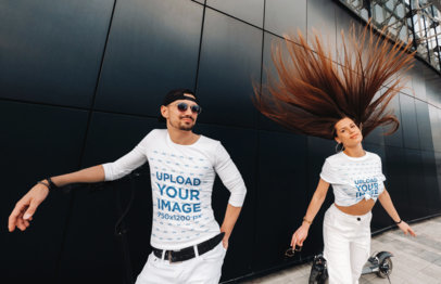 Long Sleeve and T-Shirt Mockup Featuring a Couple Riding Scooters