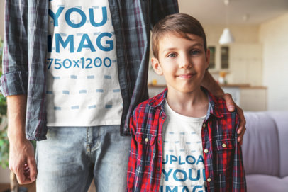 T-Shirt Mockup of the Closeup of a Kid Posing with His Dad