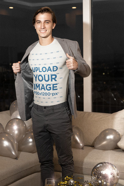 Mockup of a Man Showing His T-Shirt at an NYE Party