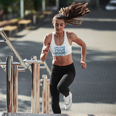 Sports Bra Mockup of a Woman Sprinting Up a Flight of Stairs