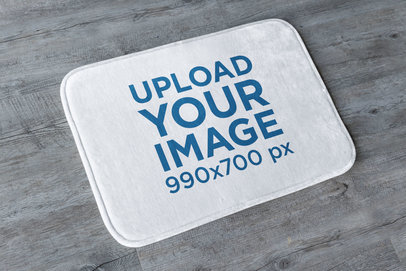 Mockup of a Doormat on a Wooden Floor