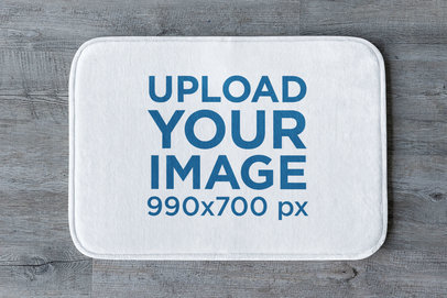 Bath Mat Mockup Placed over a Wooden Surface