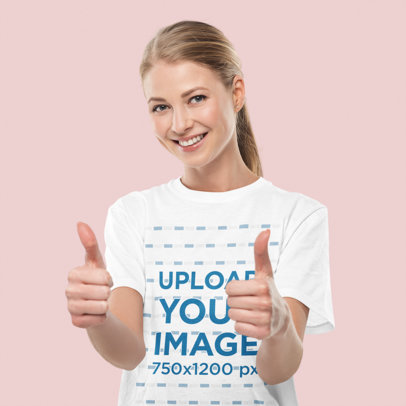 Round-Neck Tee Mockup of a Smiling Woman Giving Thumbs-Up to the Camera