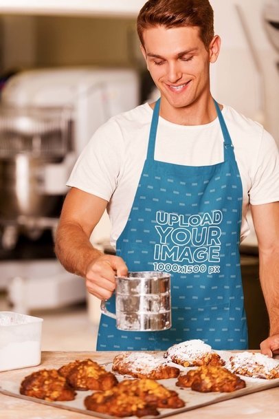 Apron Mockup Featuring a Smiling Man Baking Pastries