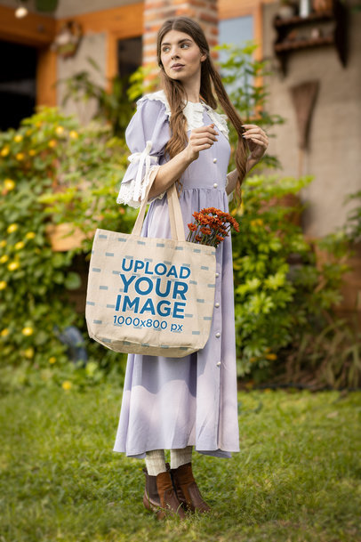 Totebag Mockup of a Woman Wearing a Cottagecore-Style Outfit M18726
