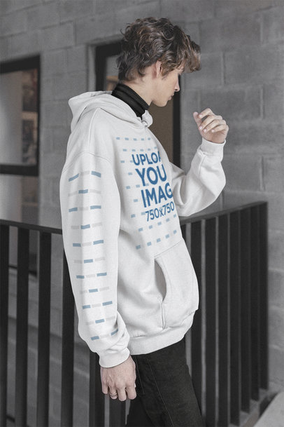 Hoodie Mockup of an E-boy Posing by a Handrail