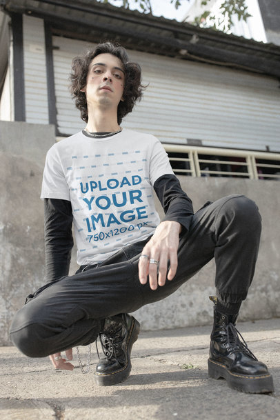 T-Shirt Mockup of a Man in an E-Boy Outfit Posing on the Street
