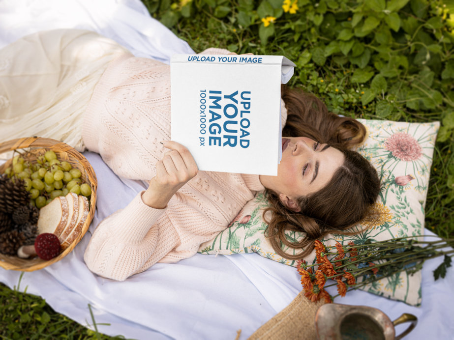 Book Mockup Featuring a Woman in a Cottagecore-Styled Outfit Reading