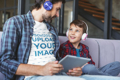 T-Shirt Mockup of a Father Listening to Music With His Son
