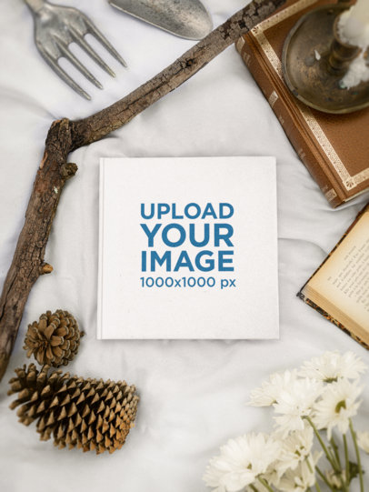 Mockup of a Squared Book Featuring a Cottagecore-Aesthetic Theme M18738