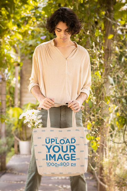 Tote Bag Mockup of a Young Man Featuring a Cottagecore Aesthetic M18725