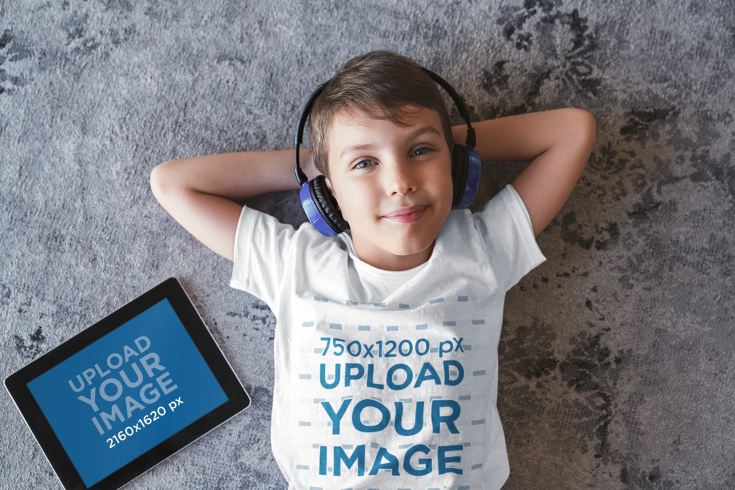 T-Shirt Mockup of a Little Kid Listening Music on His iPad 