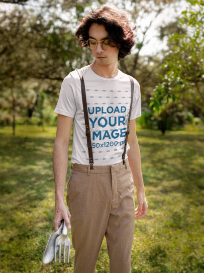 Cottagecore-Inspired T-Shirt Mockup of a Man With Glasses