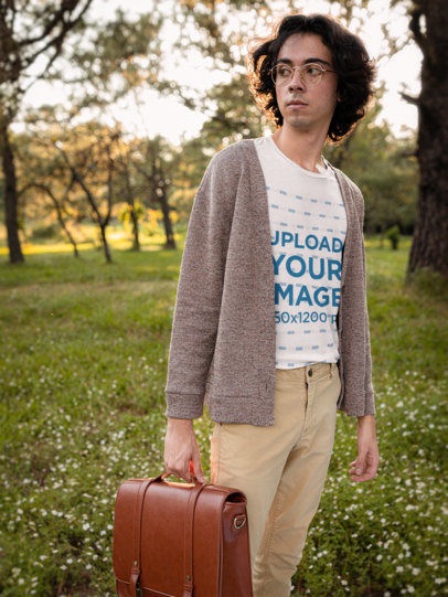 Cottagecore-Themed T-Shirt Mockup of a Young Man Posing Amongst Trees M18721