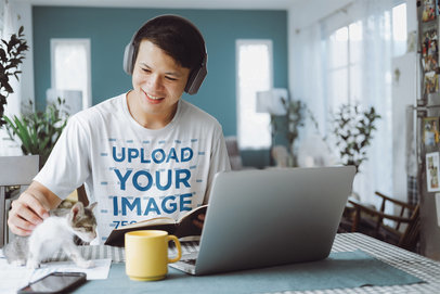 T-Shirt Mockup of a Happy Man Smiling at His Kitten m11106 r-el2