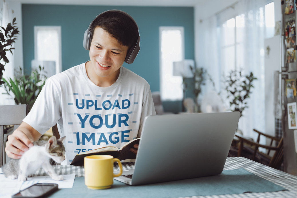 T-Shirt Mockup of a Happy Man Smiling at His Kitten