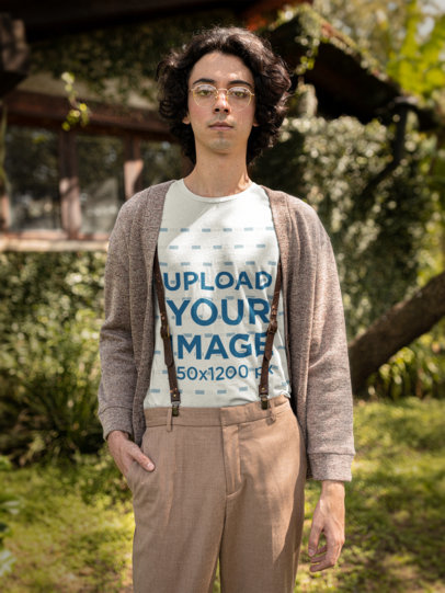 Tee Mockup of a Man with a Cottagecore-Inspired Outfit by a Countryside House M18718