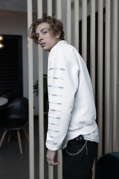 Mockup of a Man in an E-Boy Outfit Showcasing the Sleeve of His Sweatshirt m19902