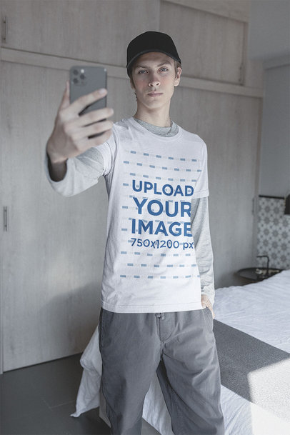 T-Shirt Mockup of an E-Boy Taking a Selfie in His Room
