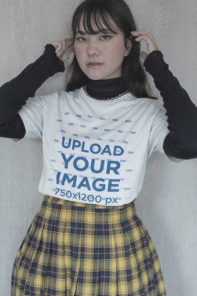 Mockup of a Serious E-girl Wearing a Bella Canvas Tee