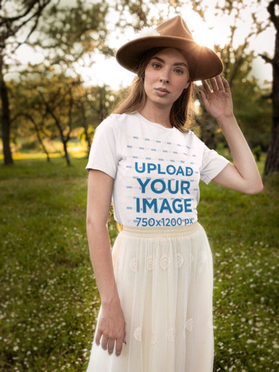 Bella Canvas T-Shirt Mockup of a Woman Posing in Nature