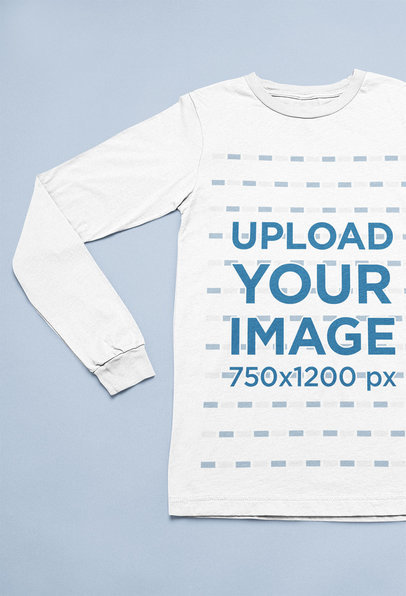 Mockup of a Long Sleeve Tee Flat Laid over a Solid Surface