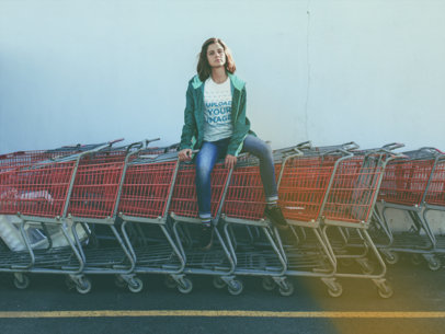 Woman Sitting on Shopping Carts Wearing a T-Shirt Mockup