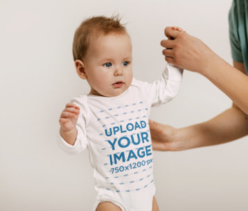 Onesie Mockup of a Baby Boy Attempting to Walk m19245-r-el2