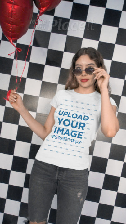 Video of a Happy Woman Wearing a T-Shirt Featuring a Valentine's Day Theme