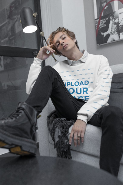 Mockup of a Bold E-Guy Posing with a Sweatshirt