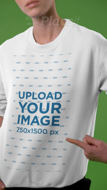 Video of a Woman Pointing at Her Sweatshirt in a Studio