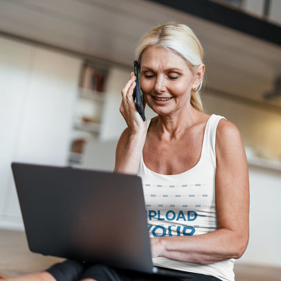 Tank Top Mockup of a Middle-Aged Woman Talking on the Phone