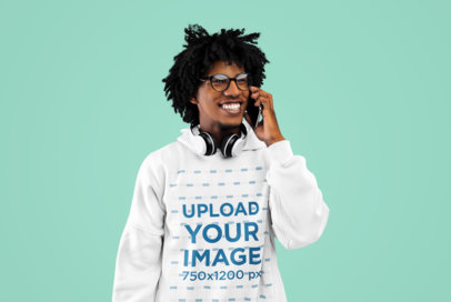 Pullover Hoodie Mockup of a Smiling Man With Glasses Making a Call