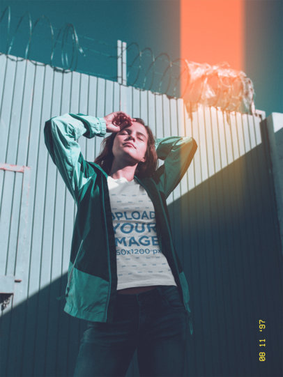 Vintage Shot of a Woman Wearing a Tshirt Mockup Outside a Gate