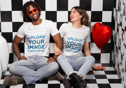 Tee Mockup of a Smiling Couple in a Valentine's Day Setting with Checkered Tiles