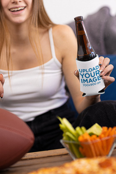 Koozie Mockup Featuring a Long-Haired Woman at a Football Watch Party