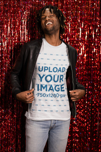 Bella Canvas Tee Mockup of a Happy Man Standing Against a Red Foil Fringe Curtain m20974