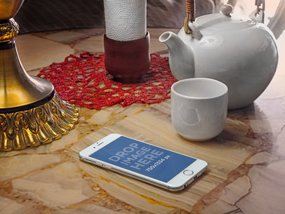 White iPhone 6 On Tea Shop