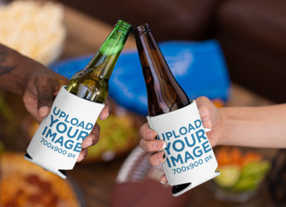 Koozie Mockup Featuring Two Friends Making a Toast with Beer
